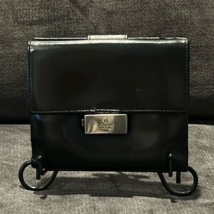 Gucci Authentic Black French Flap Leather Wallet with Silver Hardware.